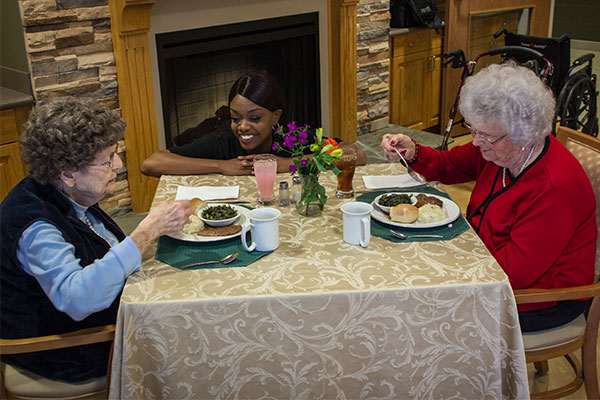 Woodbury Dining staff converse with patients